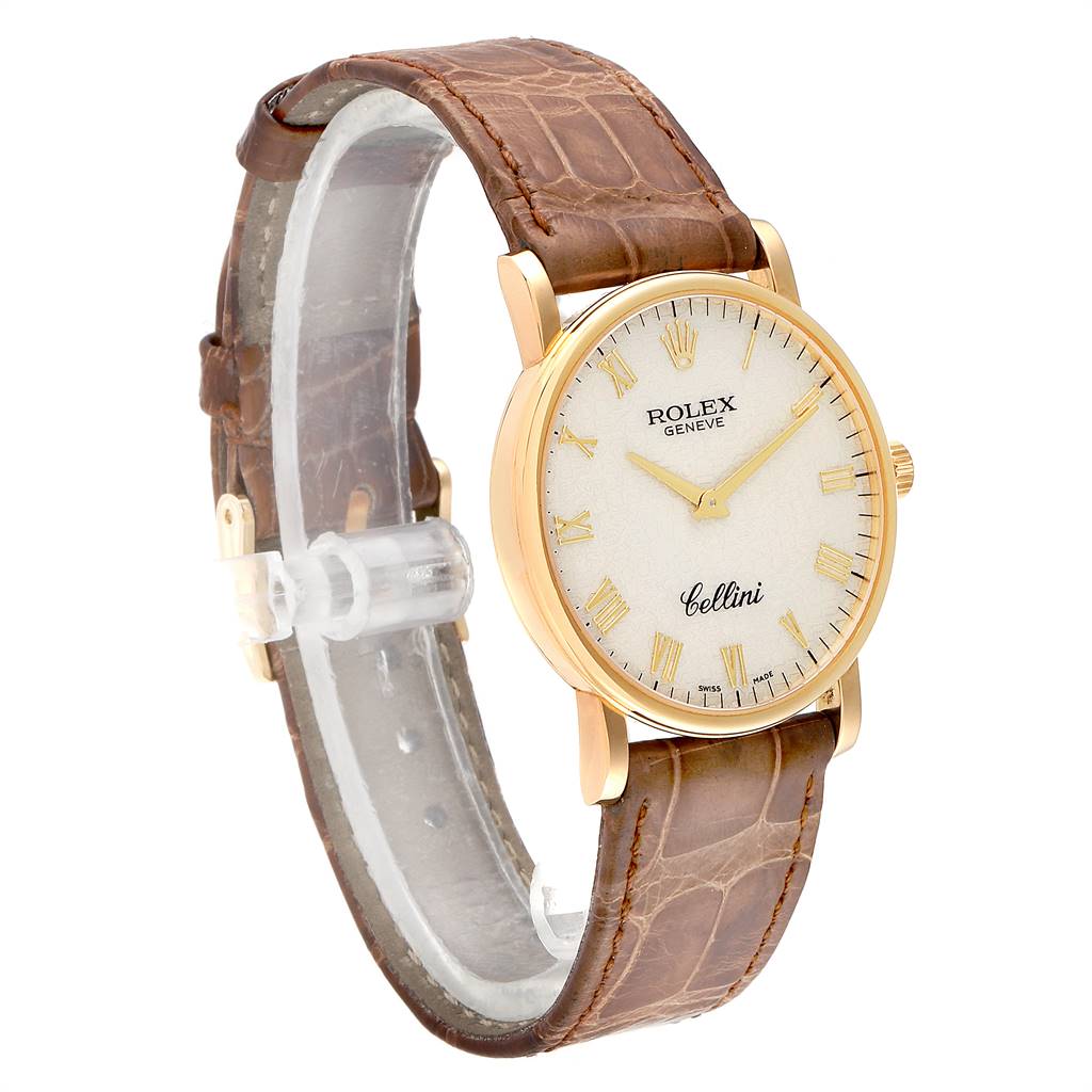 This image shows a Rolex Cellini 5115 Men's Yellow Gold Beige Dial 5115 Men's Yellow Gold Beige Dial watch at a three-quarter angle, highlighting its face and leather strap.