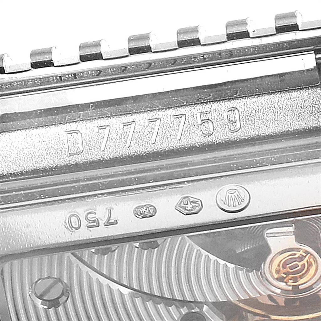 The image shows a close-up of the Rolex Cellini 5441 Men's White Gold Silver Dial 5441 Men's White Gold Silver Dial watch, highlighting the serial number, hallmarks, and part of the movement.