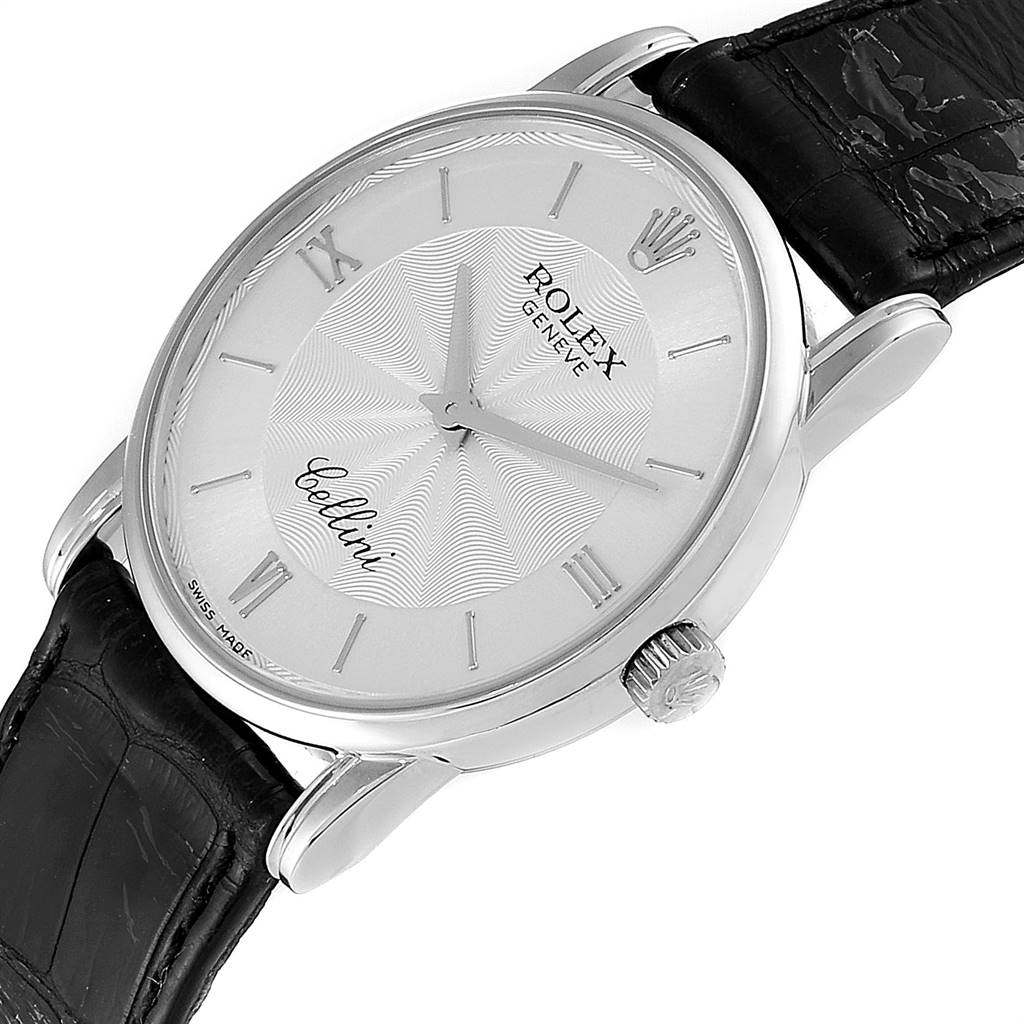 The image displays a slight angled view of the Rolex Cellini 5116 Men
s White Gold Silver Dial 5116 Men
s White Gold Silver Dial watch face, lugs, crown, and part of the leather strap.