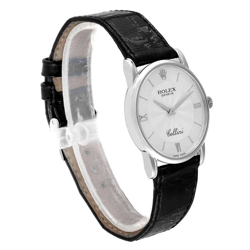 The image shows a side angle view of a Rolex Cellini 5116 Men
s White Gold Silver Dial 5116 Men
s White Gold Silver Dial watch, focusing on its black leather strap and silver dial.