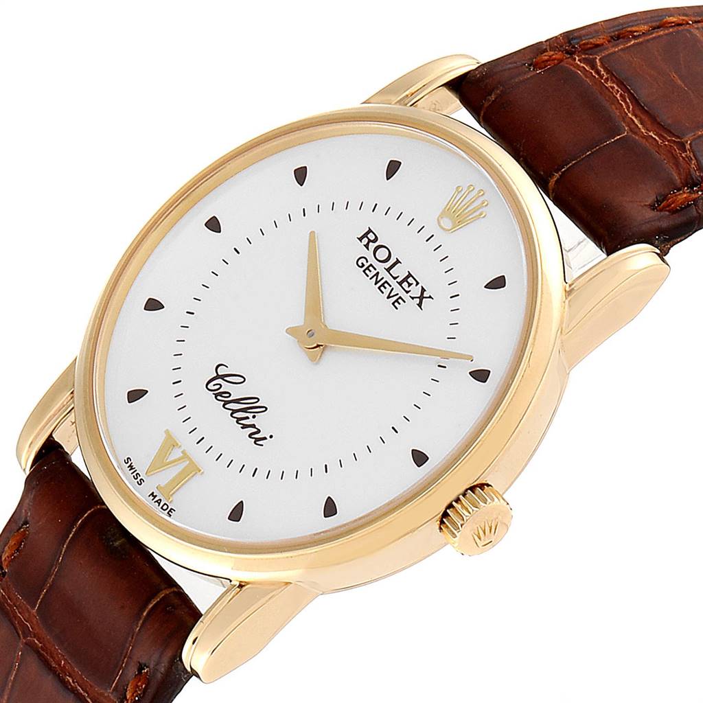 The image shows a close-up of a Rolex Cellini 5116 Men's Yellow Gold Silver Dial 5116 Men's Yellow Gold Silver Dial watch face at a slight angle, highlighting the dial, hands, crown, and leather strap.