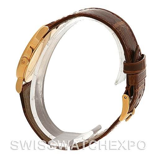 The image shows a side view of the strap and clasp of a Rolex Cellini 5115 Yellow Gold Black Dial 5115 Yellow Gold Black Dial watch with a brown leather band and gold buckle.