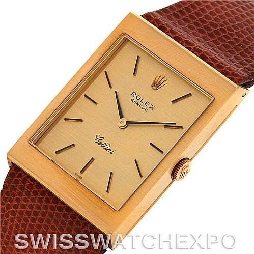 The image shows a top-down angle of the Rolex Cellini 4027 Men
s Yellow Gold Champagne Dial 4027 Men
s Yellow Gold Champagne Dial watch
s face and side crown, with a brown leather strap.