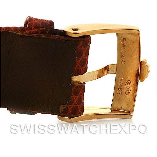 This image shows a close-up of the buckle and leather strap of a Rolex Cellini 4027 Men
s Yellow Gold Champagne Dial 4027 Men
s Yellow Gold Champagne Dial watch from the side angle.