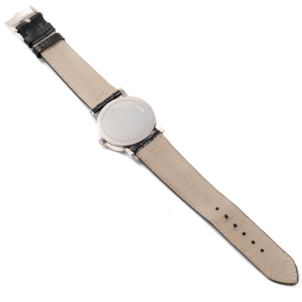 The image shows the back view of a Rolex Cellini 5115 Men's White Gold Silver Dial 5115 Men's White Gold Silver Dial watch, displaying its case back and leather strap.