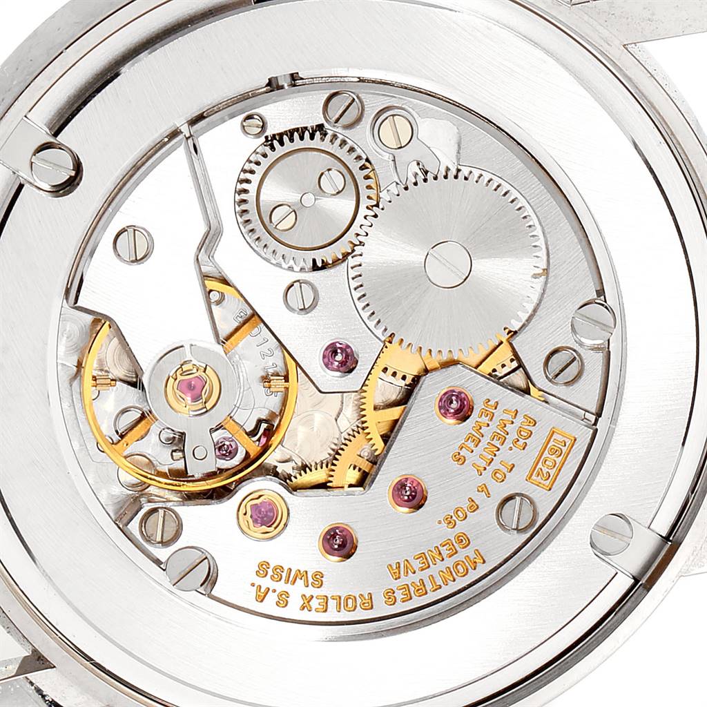 The image shows a close-up view of the mechanical movement inside a Rolex Cellini 5115 Men's White Gold Silver Dial 5115 Men's White Gold Silver Dial watch.