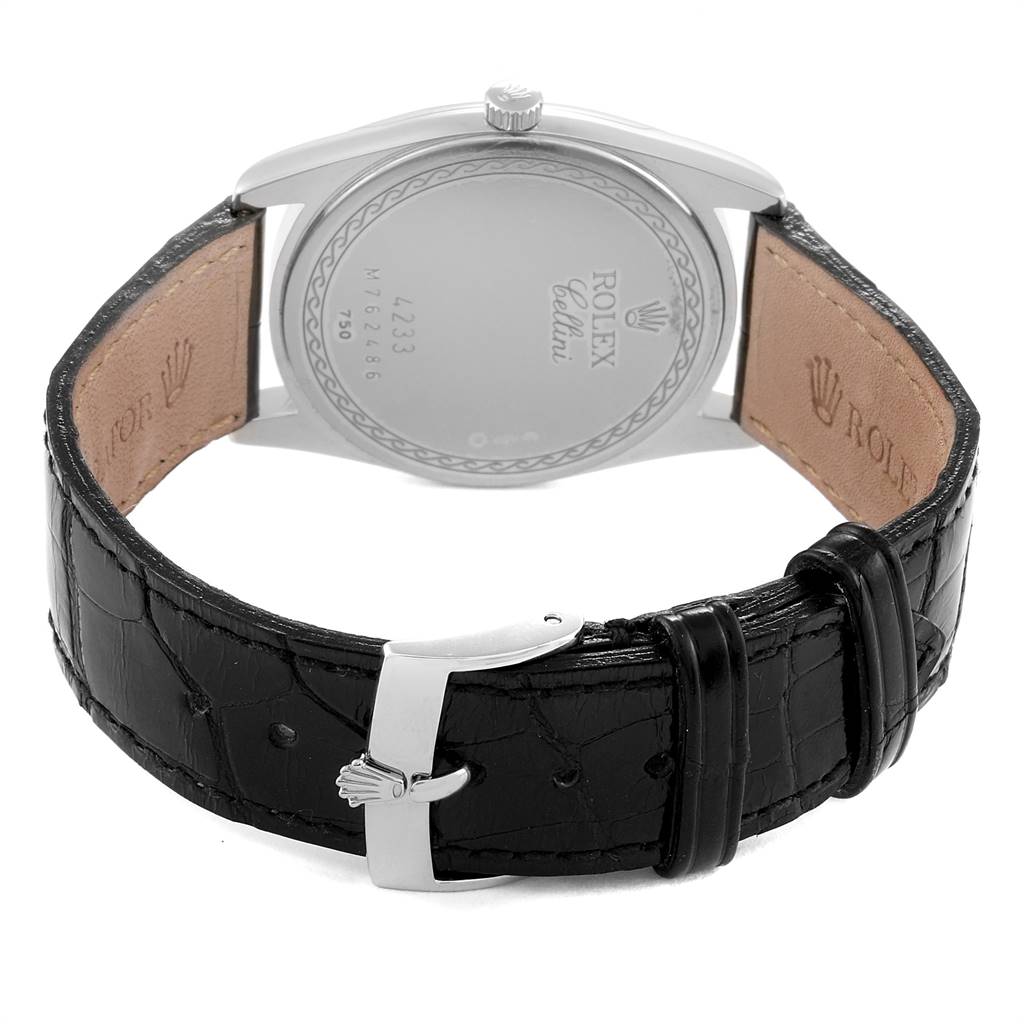 The image shows the back view of a Rolex Cellini 4233 Men's White Gold Black Dial 4233 Men's White Gold Black Dial watch, highlighting its leather strap and clasp.