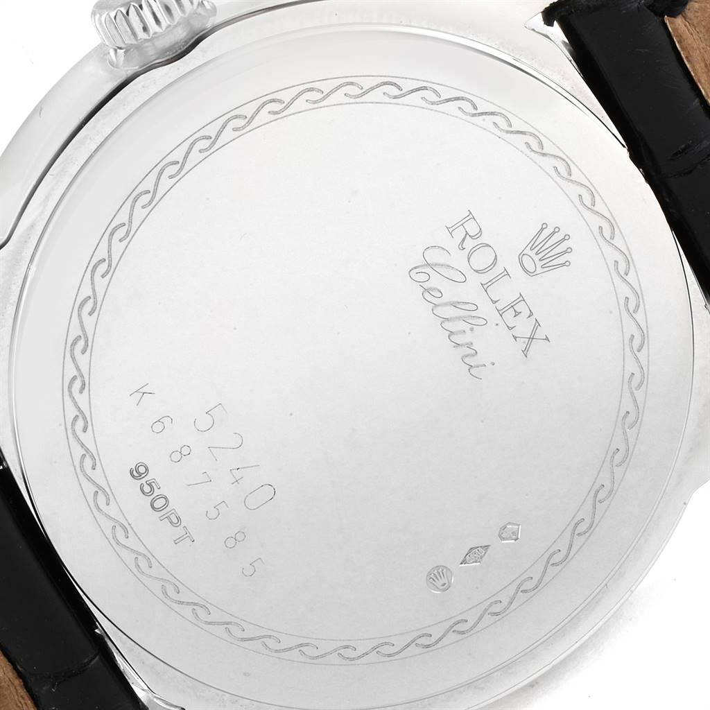 The image shows the back case of a Rolex Cellini 5240 Men's Platinum Mother of Pearl Dial 5240 Men's Platinum Mother of Pearl Dial model watch, featuring engraving details and a crown.
