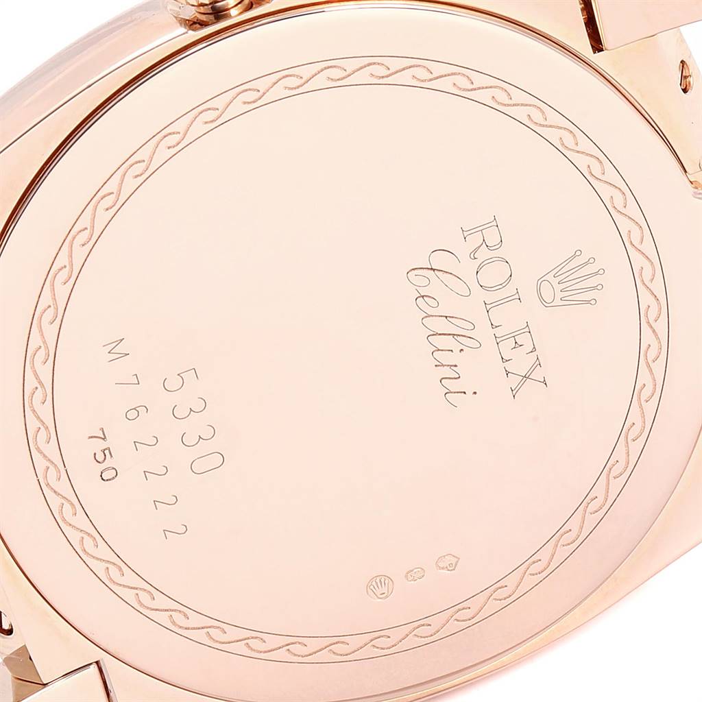 The image depicts the back case of a Rolex Cellini 5330 Men's Rose Gold White Dial 5330 Men's Rose Gold White Dial watch, showing its engraved details and model number.