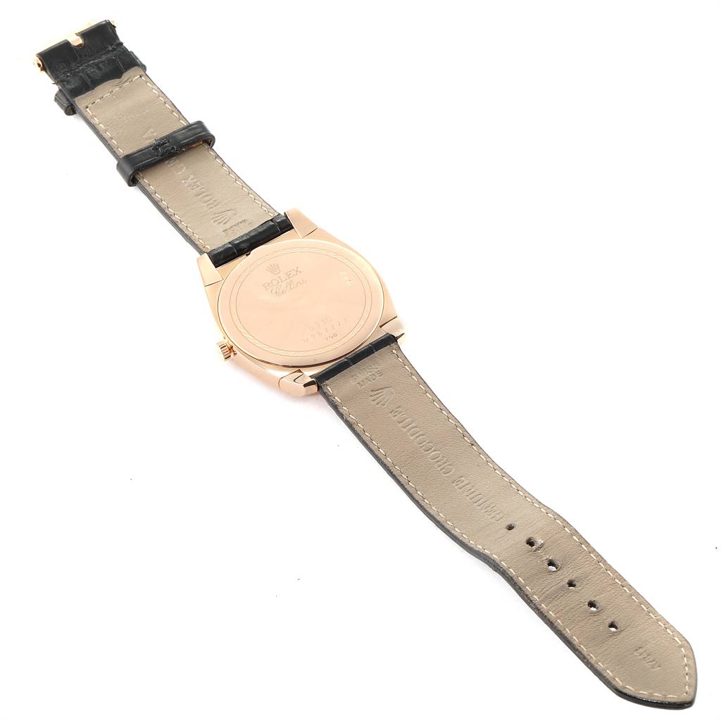 The image shows the back view of the Rolex Cellini 5330 Men's Rose Gold White Dial 5330 Men's Rose Gold White Dial watch, displaying the case back, leather strap, and clasp.