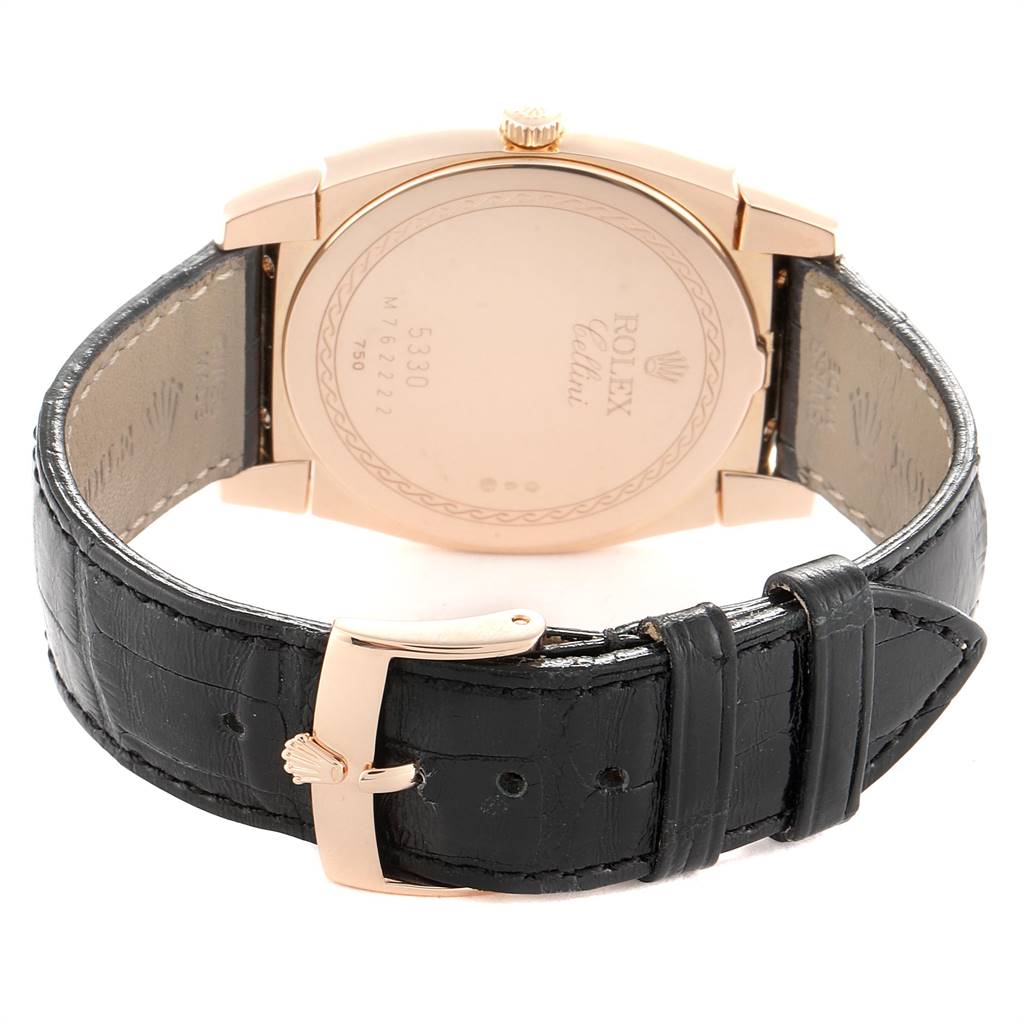 The image shows the back side of a Rolex Cellini 5330 Men's Rose Gold White Dial 5330 Men's Rose Gold White Dial watch, highlighting the case back, crown, and black leather strap with a clasp.