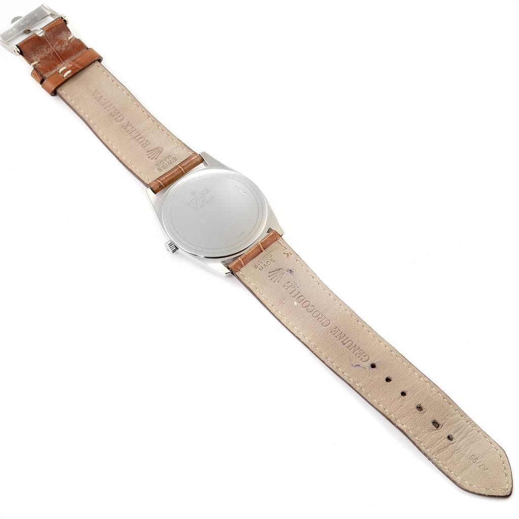 The image shows the back view of a Rolex Cellini 4233 White Gold Black Dial 4233 White Gold Black Dial watch, highlighting the case back and both leather straps.