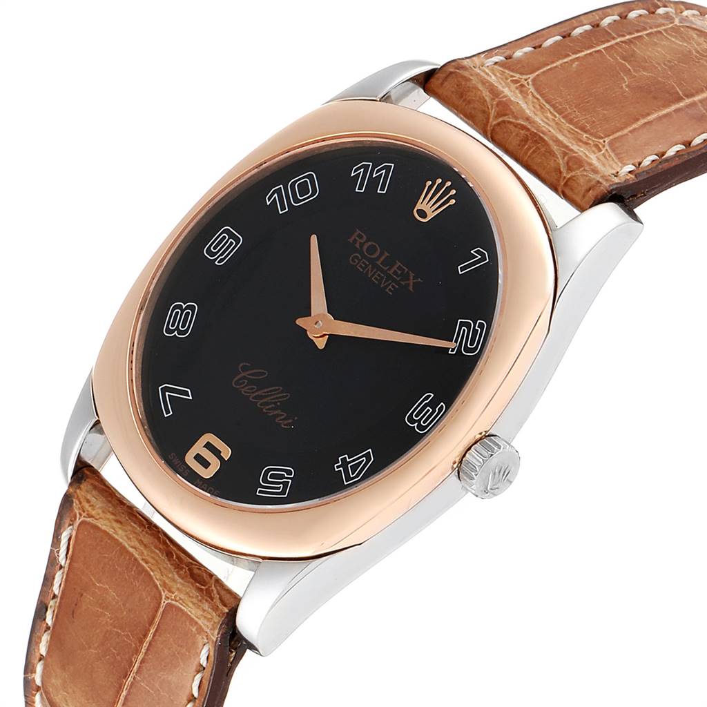 This image shows a Rolex Cellini 4233 White Gold Black Dial 4233 White Gold Black Dial watch at an angle highlighting the black dial, gold bezel, crown, and brown leather strap.