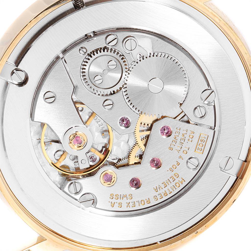 This image shows the intricate back view of the movement mechanism of a Rolex Cellini 5115 Men's Yellow Gold Silver Dial 5115 Men's Yellow Gold Silver Dial watch.