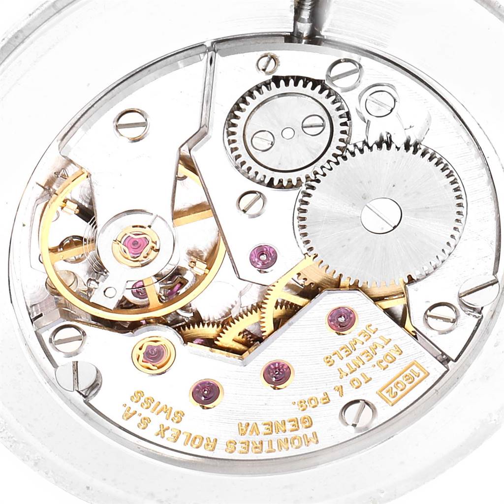 This image shows the intricate internal mechanism and gears of the Rolex Cellini 5112 Men's Yellow Gold Beige Dial 5112 Men's Yellow Gold Beige Dial watch from a close-up, top-down angle.