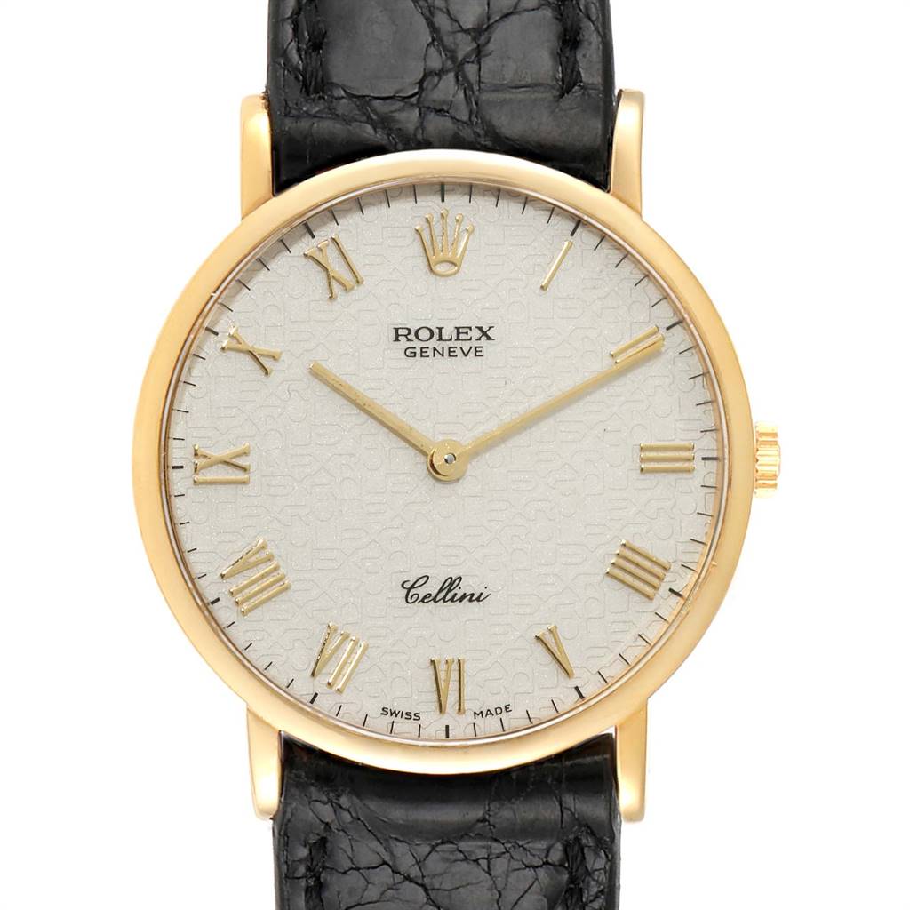 The image shows a close-up, front-facing view of a Rolex Cellini 5112 Men's Yellow Gold Beige Dial 5112 Men's Yellow Gold Beige Dial watch featuring its dial, gold Roman numerals, and black leather strap.