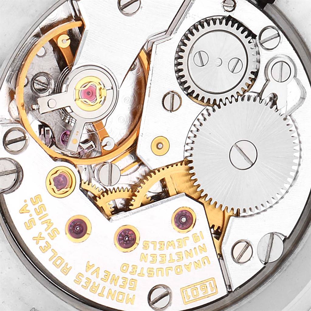 The image shows the intricate inner mechanical parts of a Rolex Cellini 4112 Men's Yellow Gold Silver Dial 4112 Men's Yellow Gold Silver Dial watch, viewed from the back.