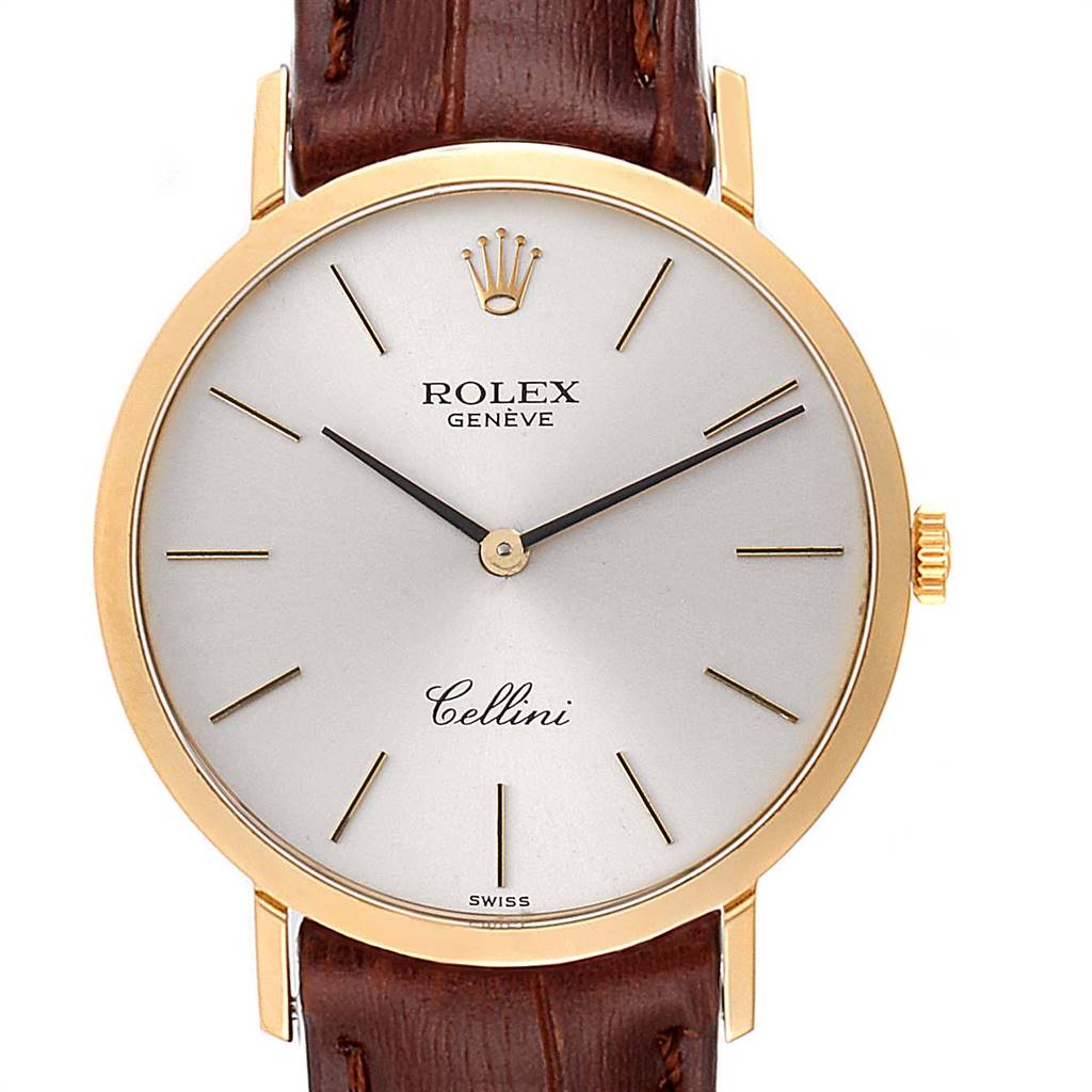 The Rolex Cellini 4112 Men's Yellow Gold Silver Dial 4112 Men's Yellow Gold Silver Dial watch is shown from a front angle, highlighting the dial, crown, and a part of the leather strap.