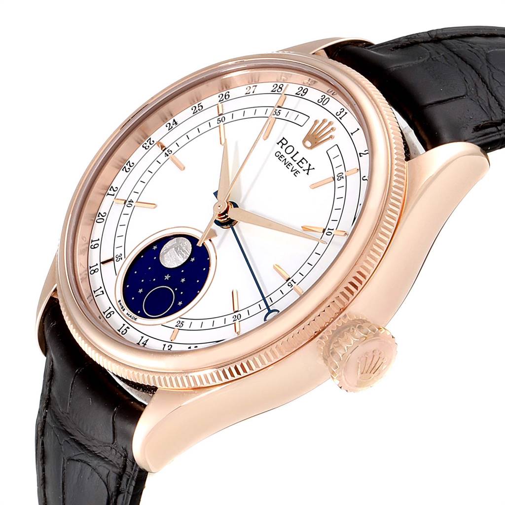 The image shows a Rolex Cellini 50535 Men
s Rose Gold White Dial 50535 Men
s Rose Gold White Dial model watch at an oblique angle, highlighting its dial, crown, and black strap.