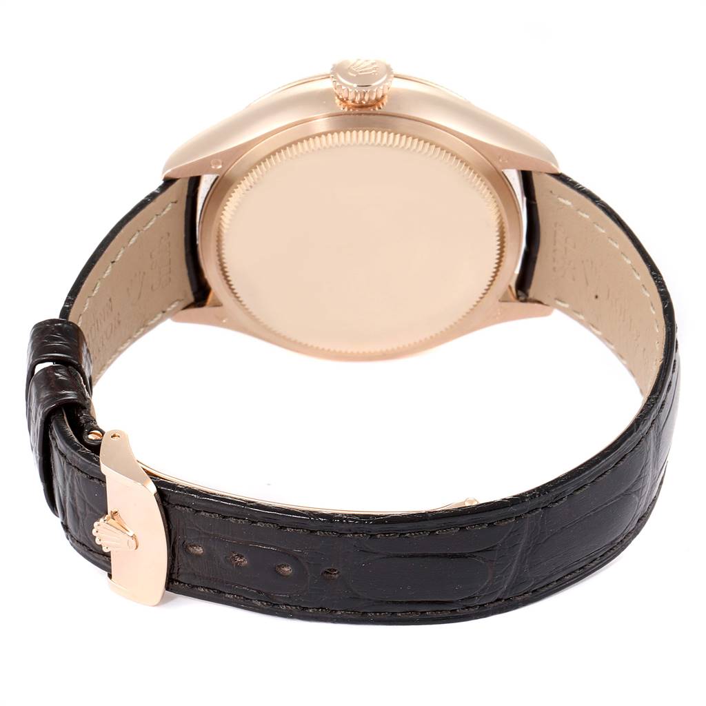 The image shows the back and side view of a Rolex Cellini 50535 Men
s Rose Gold White Dial 50535 Men
s Rose Gold White Dial watch, focusing on the case, crown, and leather strap with buckle.