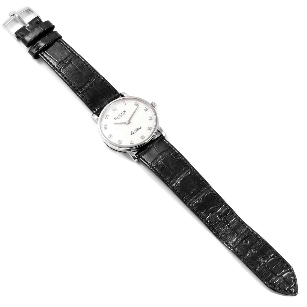 The image shows a top-down view of a Rolex Cellini 5115 Men's White Gold Mother of Pearl Dial 5115 Men's White Gold Mother of Pearl Dial watch with a black leather strap and a white dial.