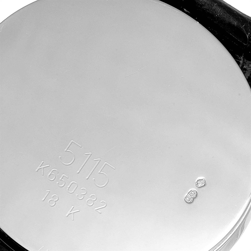 This image shows the back case of a Rolex Cellini 5115 Men's White Gold Mother of Pearl Dial 5115 Men's White Gold Mother of Pearl Dial watch, displaying its model number and hallmark engravings.