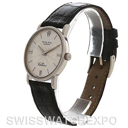 The image shows a side angle view of the Rolex Cellini 5115/9 White Gold Silver Dial 5115/9 White Gold Silver Dial watch, highlighting its face, bezel, crown, and leather strap.
