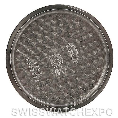 This image shows the underside of a Rolex Cellini 4233 White Gold White Dial 4233 White Gold White Dial watch case back, focusing on its intricate internal engravings and markings.