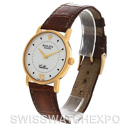 This image shows a Rolex Cellini 5115 Yellow Gold White Dial 5115 Yellow Gold White Dial watch at a slight angle, displaying its round gold case, white dial, brown leather strap, and crown.