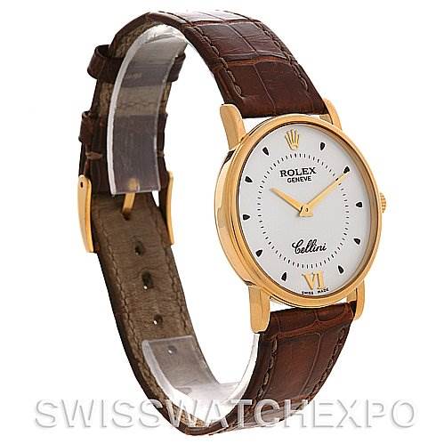 This image shows a side angle of a Rolex Cellini 5115 Yellow Gold White Dial 5115 Yellow Gold White Dial watch with a gold case and brown leather strap.