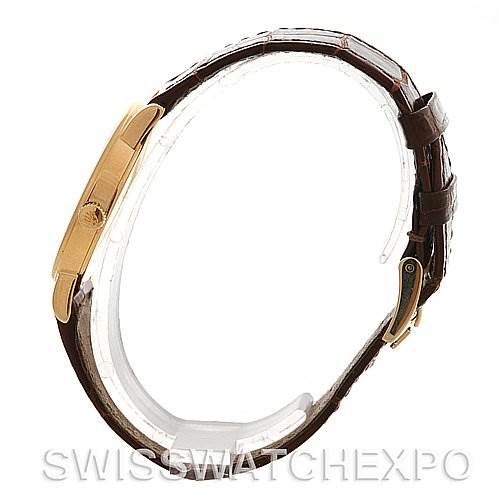 This image shows a side profile view of a Rolex Cellini 5115 Yellow Gold White Dial 5115 Yellow Gold White Dial watch, highlighting the gold case and brown leather strap.