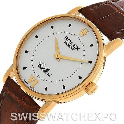 The image shows a Rolex Cellini 5115 Yellow Gold White Dial 5115 Yellow Gold White Dial watch from an angled side view, highlighting its dial, golden case, crown, and brown leather strap.