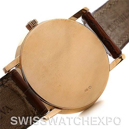 This image shows the back and side view of a Rolex Cellini 5115 Yellow Gold White Dial 5115 Yellow Gold White Dial watch case, highlighting the crown and leather straps.