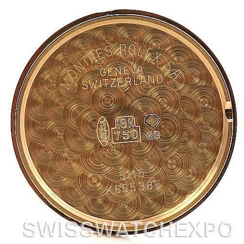 The image shows the inner case back of a Rolex Cellini 5115 Yellow Gold White Dial 5115 Yellow Gold White Dial watch, inscribed with model details and hallmark stamps. 