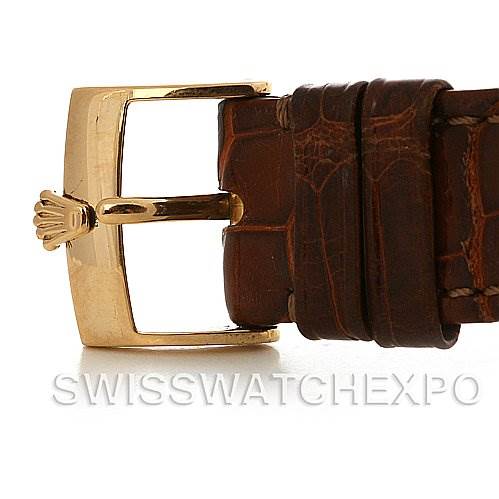 The image shows a close-up of the buckle and leather strap of a Rolex Cellini 5115 Yellow Gold White Dial 5115 Yellow Gold White Dial watch.