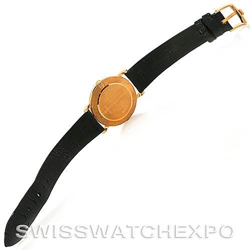 This image shows the back and the strap of a Rolex Cellini 5112 Yellow Gold Beige Dial 5112 Yellow Gold Beige Dial watch from an overhead angle.