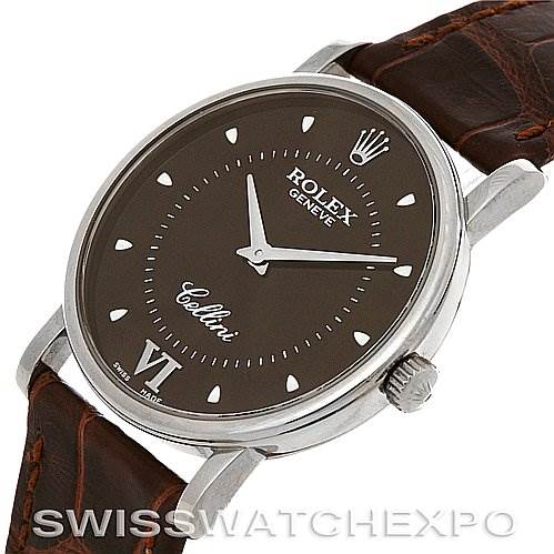 The image shows a close-up angled view of the Rolex Cellini 5115 White Gold Brown Dial 5115 White Gold Brown Dial watch, highlighting the dial, hands, crown, and part of the leather strap.