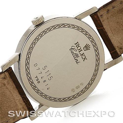 This image shows the back case and part of the leather strap of a Rolex Cellini 5115 White Gold Brown Dial 5115 White Gold Brown Dial watch.