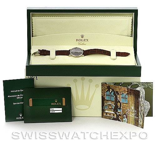 The image shows a Rolex Cellini 5115 White Gold Brown Dial 5115 White Gold Brown Dial watch with its box, manuals, and authentication cards from a frontal view.