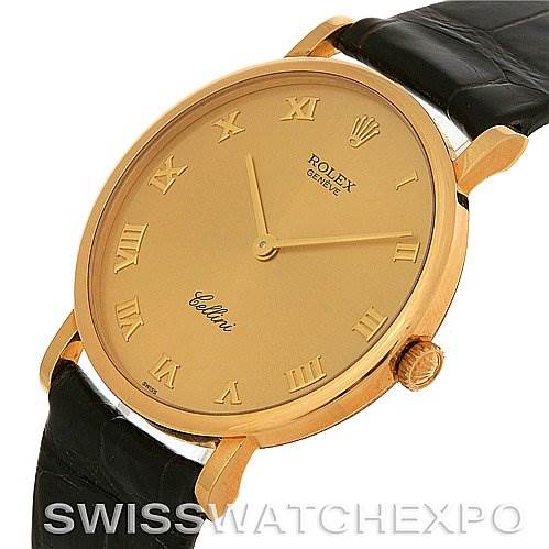 This image shows a side view of a Rolex Cellini 5112 Men's Yellow Gold Champagne Dial 5112 Men's Yellow Gold Champagne Dial watch, featuring its gold case, crown, and black leather strap.