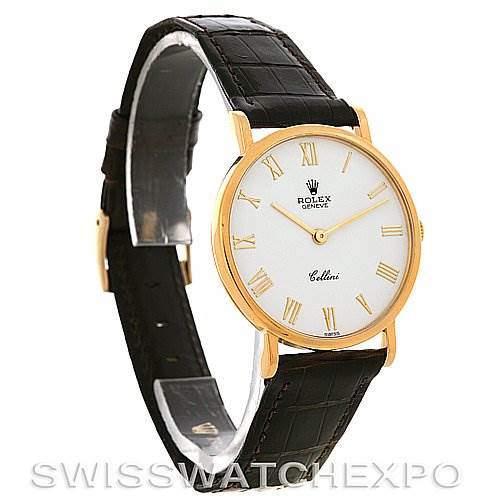 The image shows a Rolex Cellini 5112 Yellow Gold  5112 Yellow Gold  watch at a three-quarter angle, displaying its face, gold-tone case, and black leather strap.