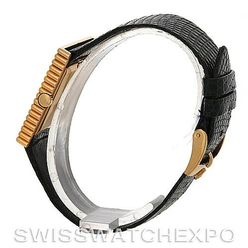 This image shows a side view of the Rolex Cellini 4012 Men
s Yellow Gold Blue Dial 4012 Men
s Yellow Gold Blue Dial watch, featuring its black leather strap and gold clasp.