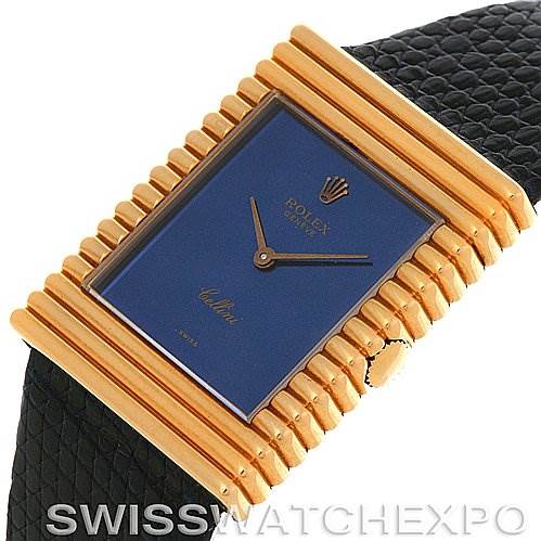 This Rolex Cellini 4012 Men
s Yellow Gold Blue Dial 4012 Men
s Yellow Gold Blue Dial watch is shown at a slight angle, highlighting the face, crown, and part of the leather strap.