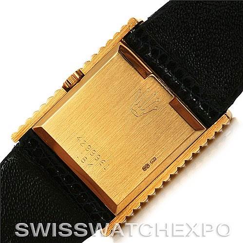 This image shows the back case and part of the strap of a Rolex Cellini 4012 Men
s Yellow Gold Blue Dial 4012 Men
s Yellow Gold Blue Dial watch, viewed from a top-down angle.