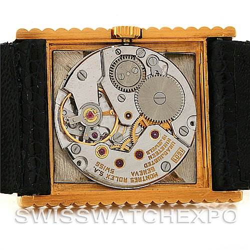 This image displays the back view of the Rolex Cellini 4012 Men
s Yellow Gold Blue Dial 4012 Men
s Yellow Gold Blue Dial watch, showcasing its internal mechanical movement.