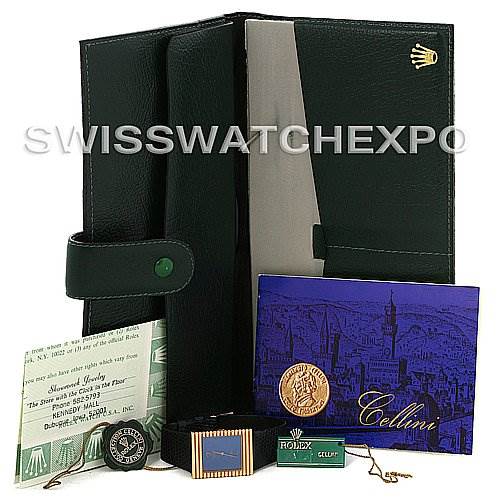 The image shows the Rolex Cellini 4012 Men
s Yellow Gold Blue Dial 4012 Men
s Yellow Gold Blue Dial watch from a front angle, along with its folder, certificate, tag, and booklet.