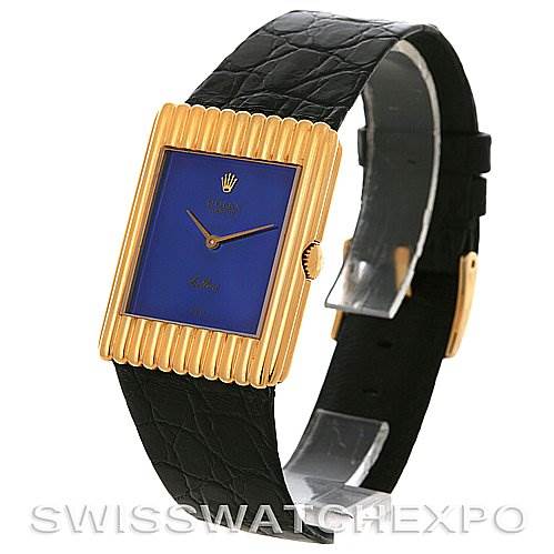 This image shows a Rolex Cellini 4106 Men's Yellow Gold Blue Dial 4106 Men's Yellow Gold Blue Dial watch, angled to display the face, crown, and black leather strap.