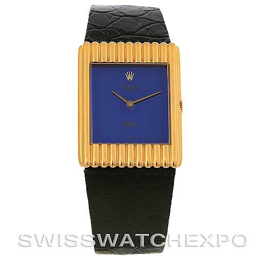 This image shows a Rolex Cellini 4106 Men's Yellow Gold Blue Dial 4106 Men's Yellow Gold Blue Dial model watch from a top-down angle, highlighting the face, bezel, and leather strap.