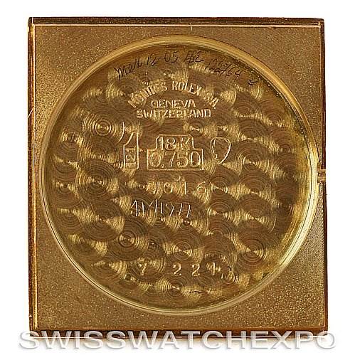 The image shows the inside of the case back of a Rolex Cellini 4106 Men's Yellow Gold Blue Dial 4106 Men's Yellow Gold Blue Dial watch, displaying engravings and hallmarks.