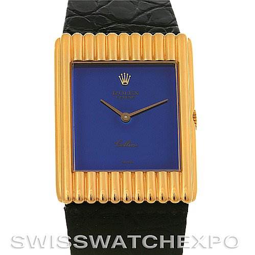 The image shows a frontal view of a Rolex Cellini 4106 Men's Yellow Gold Blue Dial 4106 Men's Yellow Gold Blue Dial watch featuring a gold rectangular case and a black leather strap.